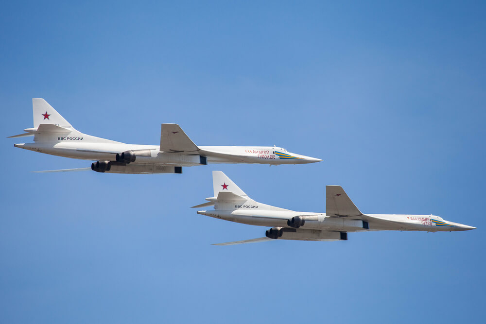 two_russian_tupolev_tu-160_nato_reporting_name_blackjack_bombers_in_flight.jpg