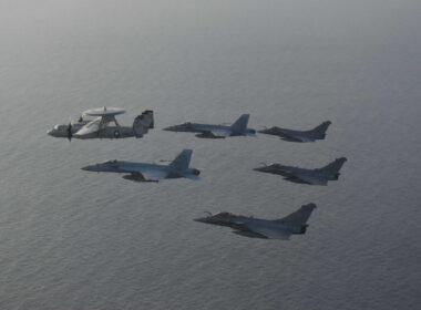 us_navy_fa-18_and_french_dassault_rafale_flying_together.jpg