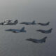 us_navy_fa-18_and_french_dassault_rafale_flying_together.jpg