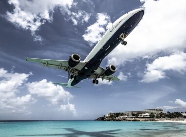 white-aircraft-above-beach-shoreline-at-daytime.jpg