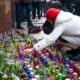 woman_lays_flowers_in_front_of_iranian_embassy_in_ukraine.jpg