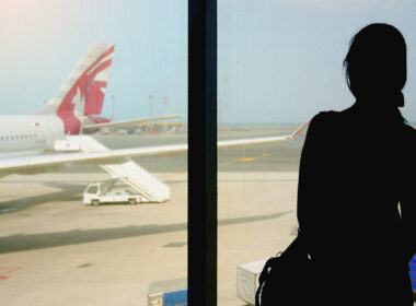 woman_waiting_to_board_in_doha_airport.jpg