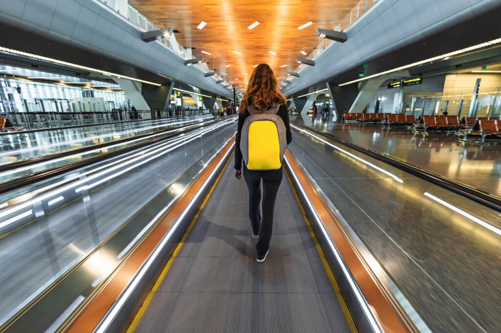 woman_walking_in_doha_airport_in_qatar.jpg