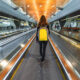 woman_walking_in_doha_airport_in_qatar.jpg