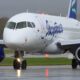 yakutia_airlines_sukhoi_superjet_at_vladivostok_airport.jpg